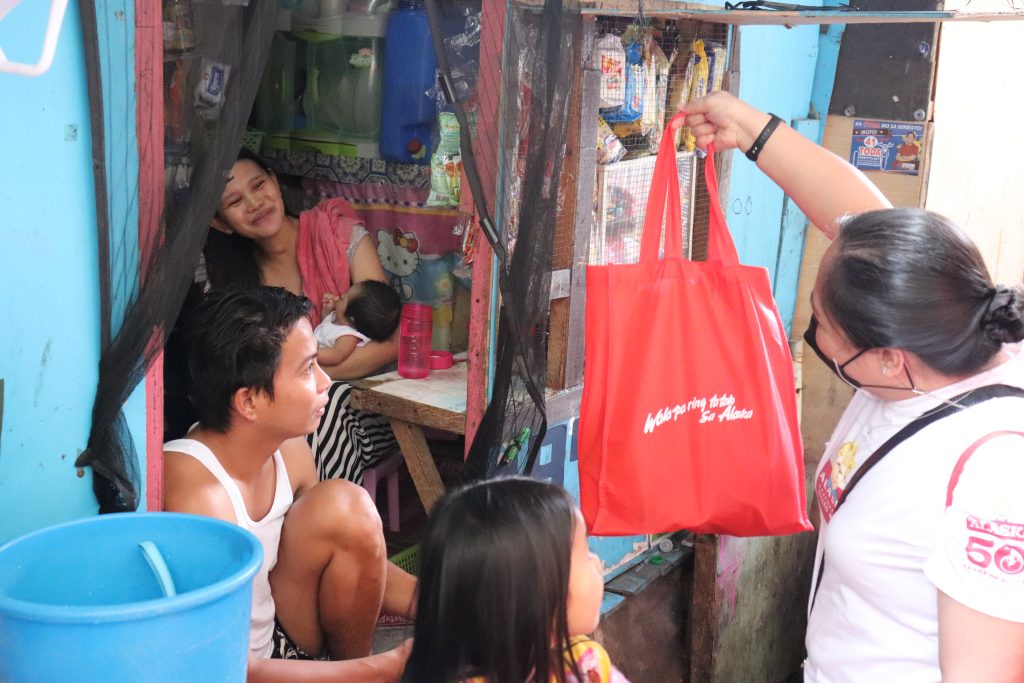 Alaska Milk partners with San Pedro PNP for an outreach program, holds